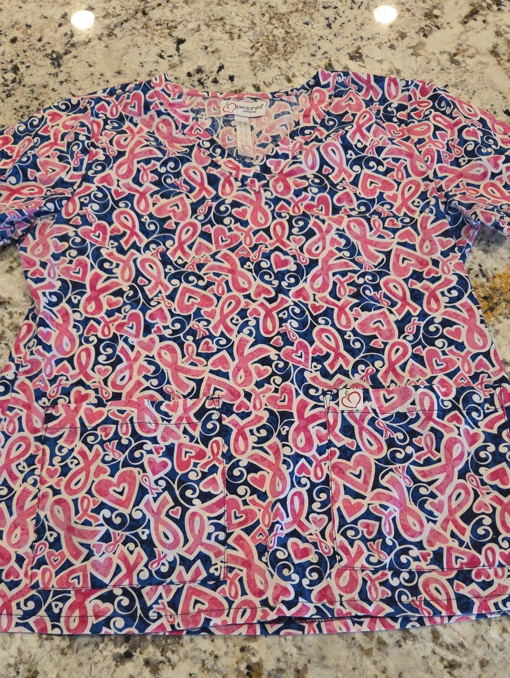 Peaches Uniforms Pink Ribbon Print Scrub Top - Navy & Pink